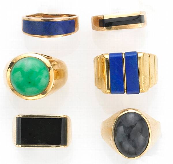 Appraisal: A collection of gem-set k and k gold rings including