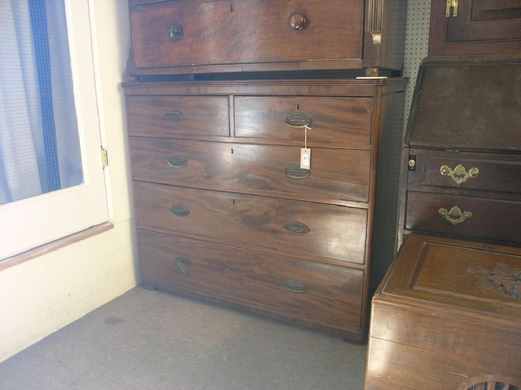 Appraisal: A late Georgian mahogany chest modified two short and three