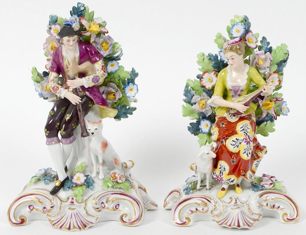 Appraisal: PAIR OF CHELSEA PORCELAIN BOCAGE FIGURES Late th Early th