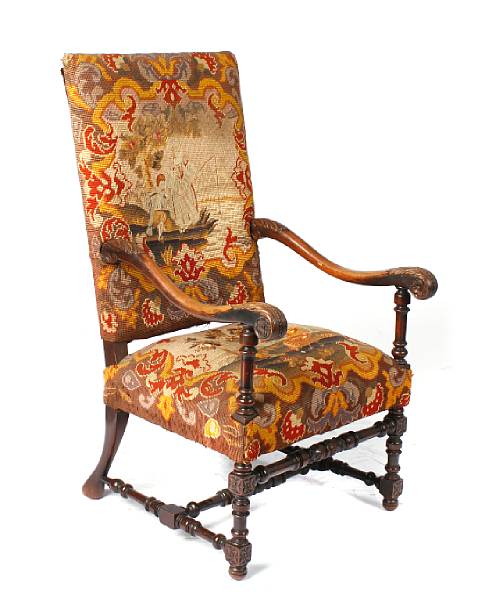 Appraisal: A Renaissance style needlepoint upholstered armchair th century needlework distressed