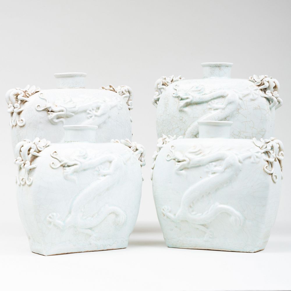 Appraisal: Four Chinese Celadon Glazed Porcelain Dragon Flasks x x in