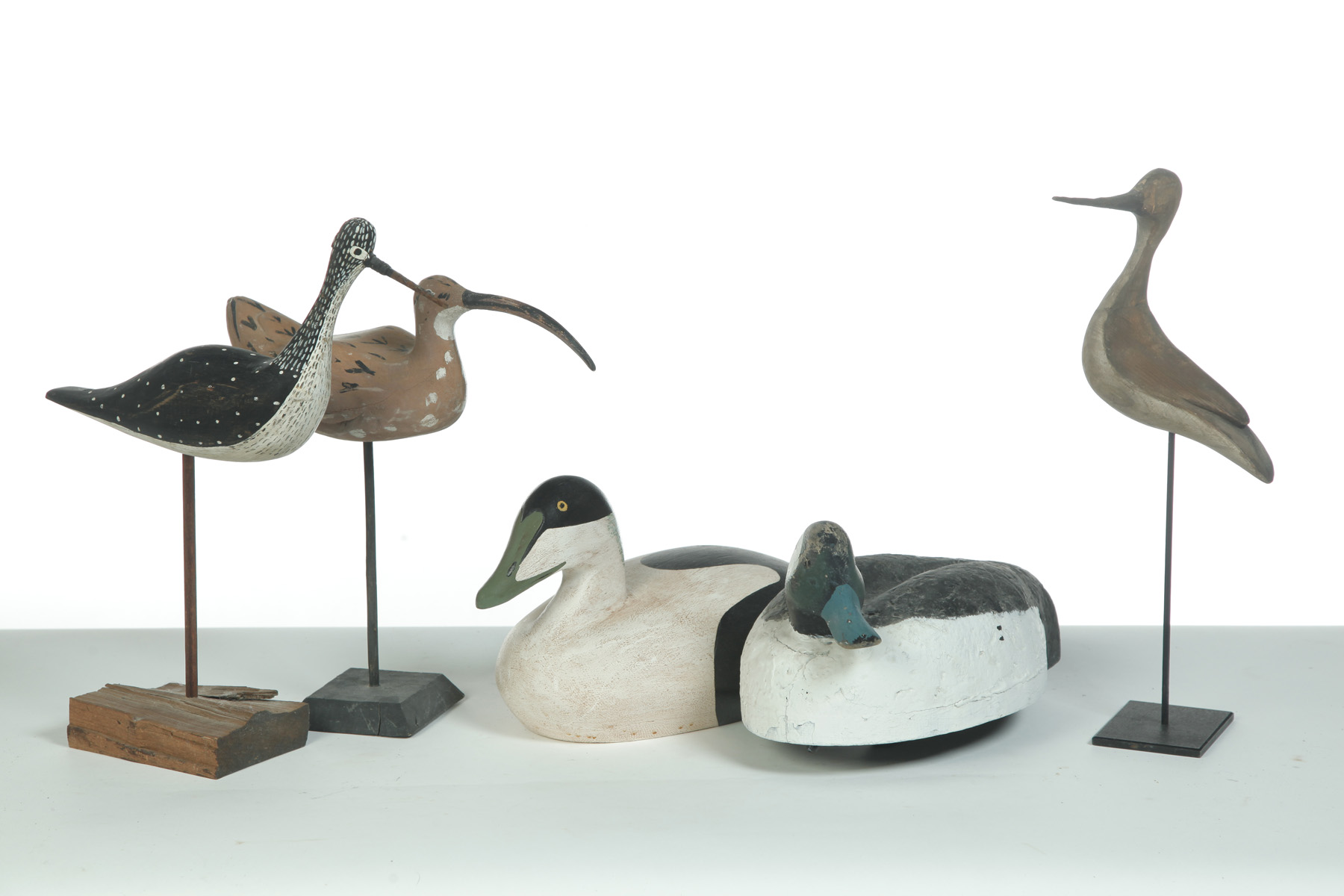 Appraisal: FIVE CARVINGS THREE SHOREBIRDS AND TWO DUCK DECOYS American nd