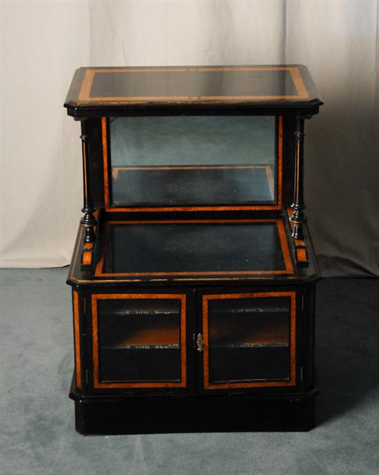 Appraisal: A Continental Mahogany Music Cabinet ebonized overall high shelf with