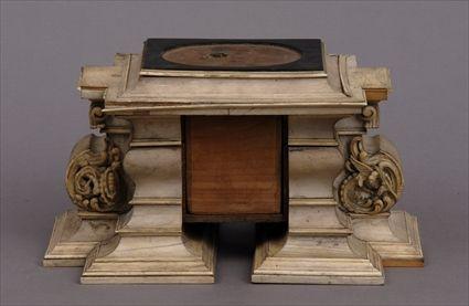 Appraisal: BAROQUE-STYLE CARVED IVORY-VENEERED ARCHITECTURAL PEDESTAL The rectangular molded top with