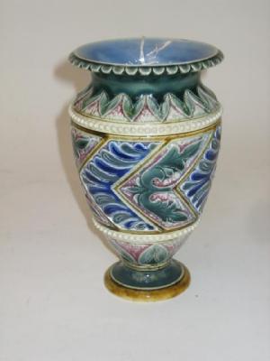 Appraisal: A DOULTON LAMBETH VASE of ovoid form moulded with stylised