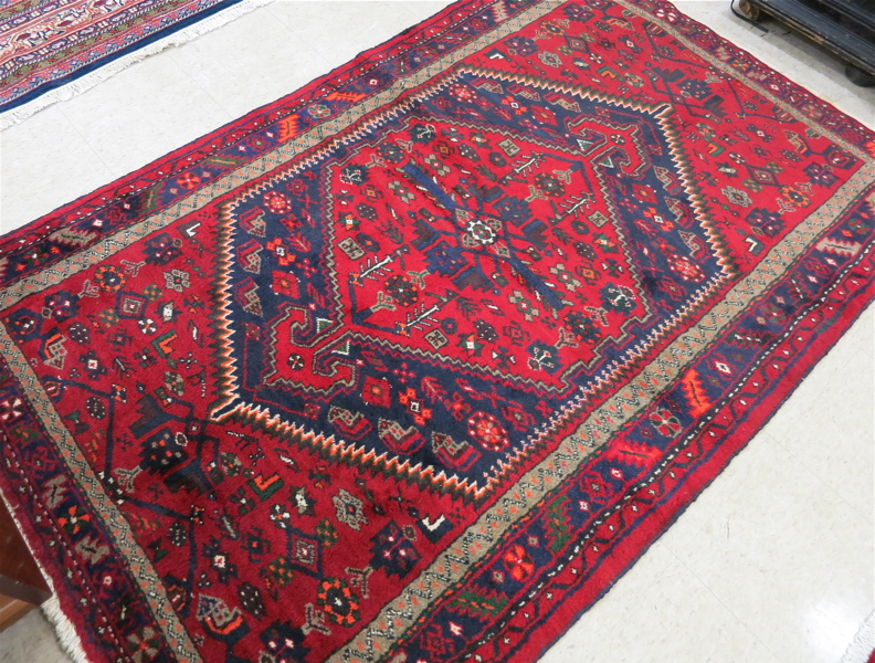 Appraisal: SEMI-ANTIQUE PERSIAN AREA RUG central hexagonal medallion and overall stylized