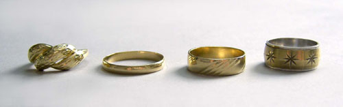 Appraisal: Eight K gold rings dwt