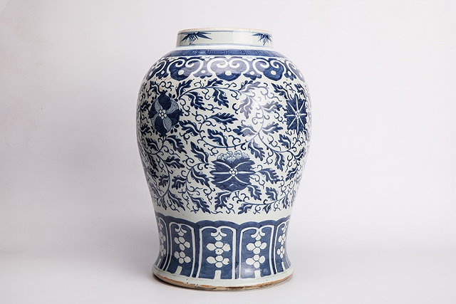 Appraisal: A CHINESE BLUE AND WHITE BALUSTER VASE with foliate scroll