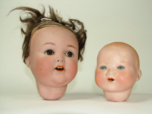 Appraisal: The parts of two Armand Marseilles bisque headed dolls moulds