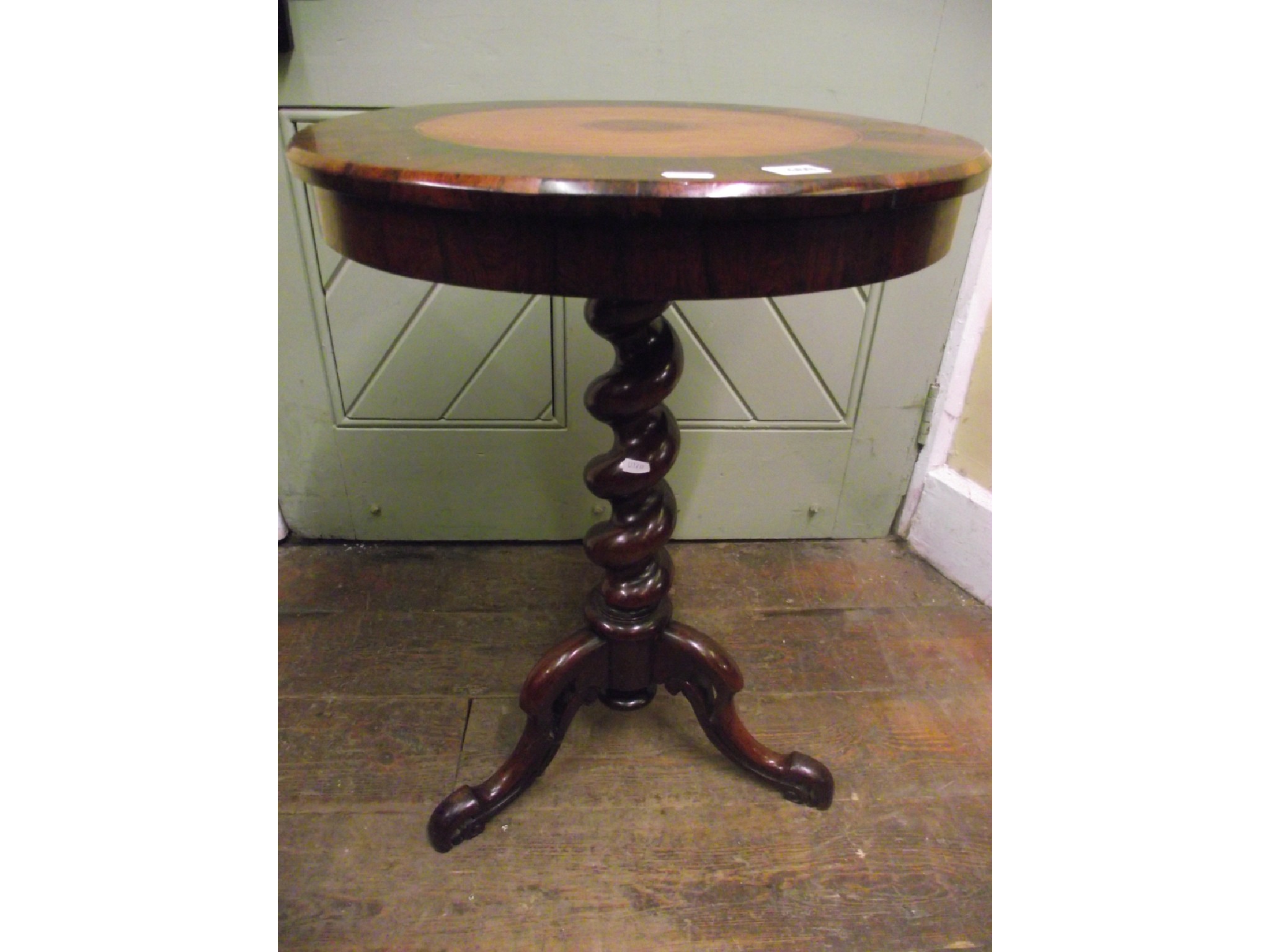 Appraisal: A mid- th century rosewood occasional table the circular top