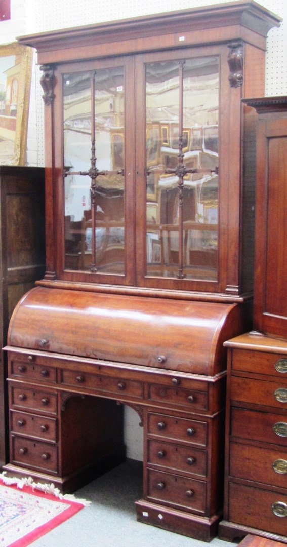 Appraisal: A Victorian mahogany cylinder bureau bookcase with pair of astragal