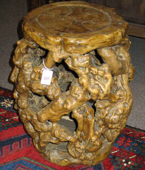 Appraisal: CHINESE ELM ROOT BARREL FORM TABLE Barrel form made of