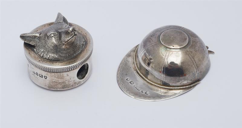 Appraisal: VICTORIAN ENGRAVED SILVER JOCKEY'S CAP AND AN ENGLISH SILVER FOX