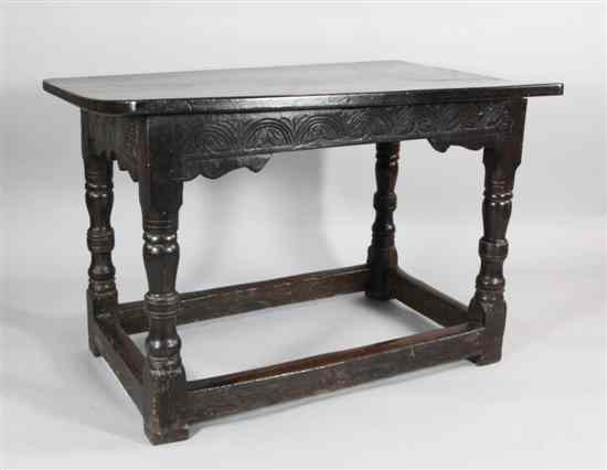 Appraisal: A late th century carved oak side table on turned