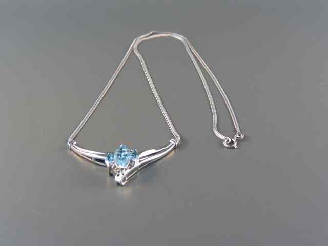 Appraisal: Blue Topaz Diamond Necklace a trio of marquise cut rich