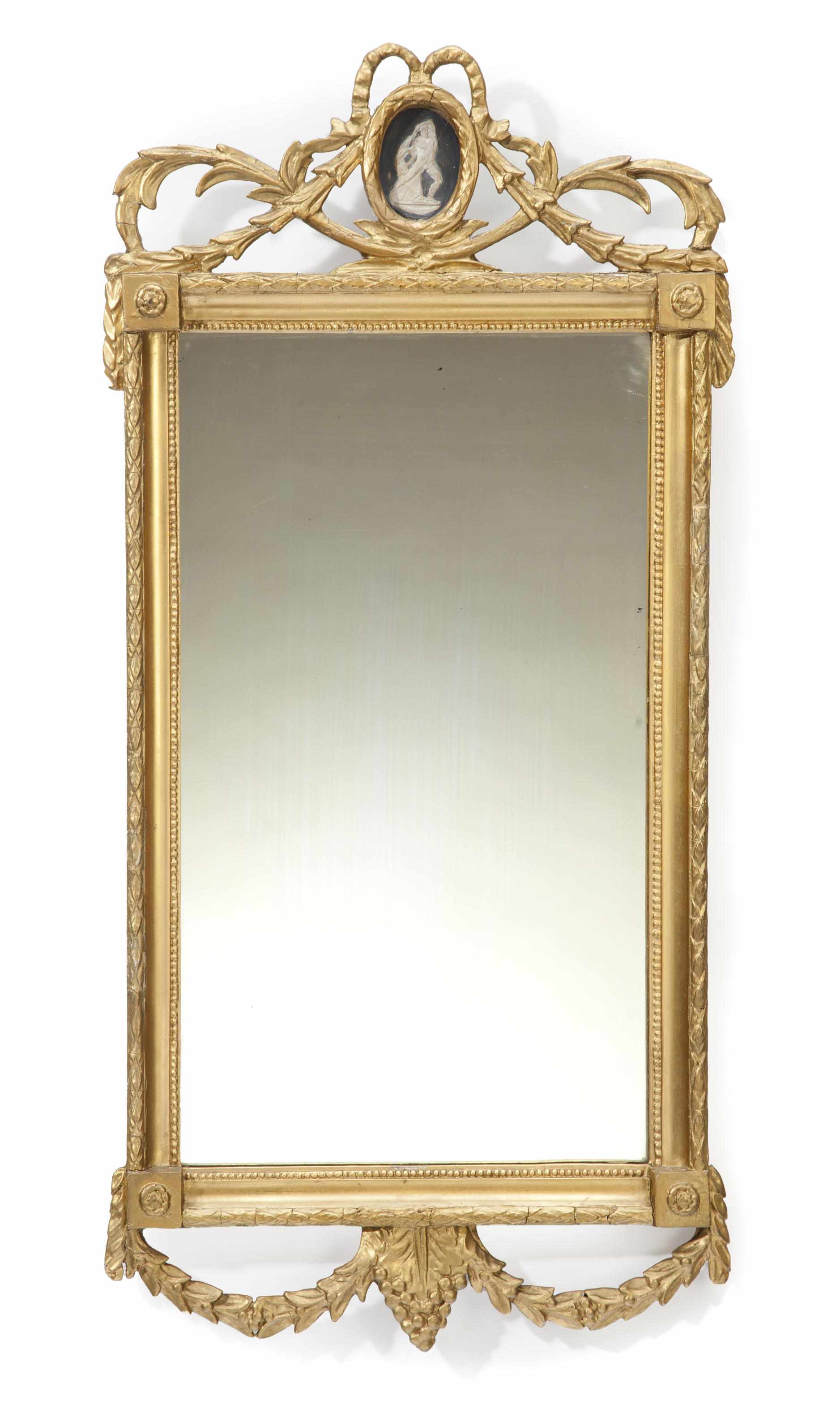 Appraisal: An Italian Neoclassical style carved giltwood and gesso mirror late