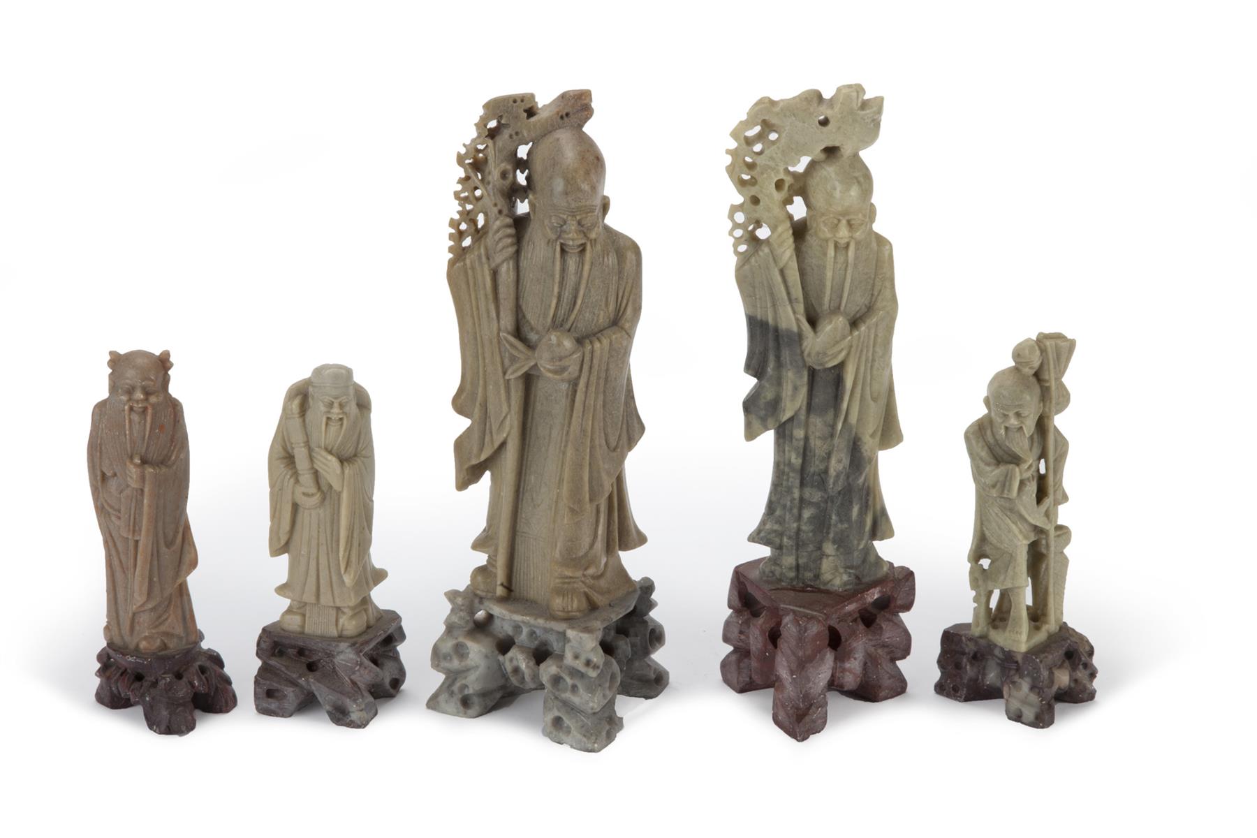 Appraisal: FIVE ASIAN SOAPSTONE FIGURES Second half- th century Two of