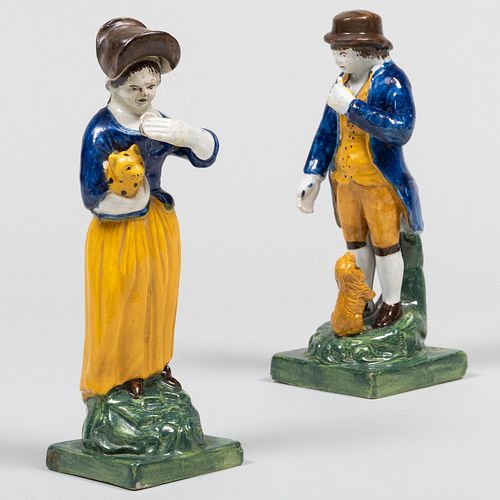 Appraisal: PAIR OF STAFFORDSHIRE PEARLWARE FIGURES OF A MAN AND WOMAN