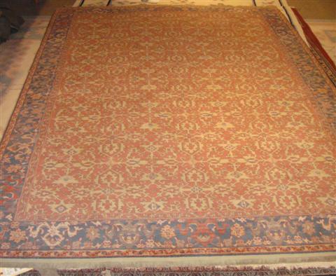 Appraisal: KARASTAN WILLIAMSBURG COLLECTION USHAK PATTERNED RUG feet inches x feet