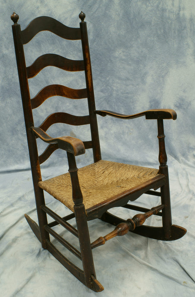 Appraisal: -slat ladder back rush seat rocking chair with bulbous front