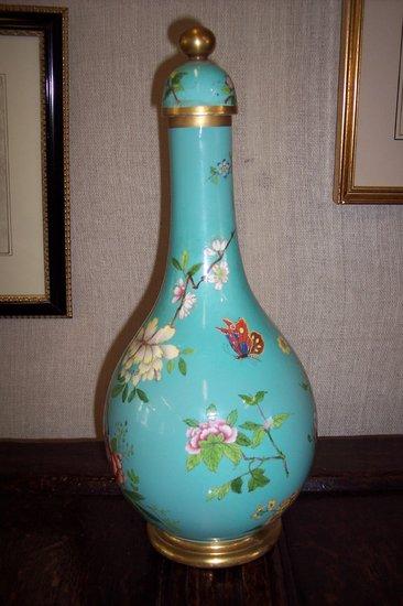 Appraisal: A th Century porcelain bottle vase and cover printed and