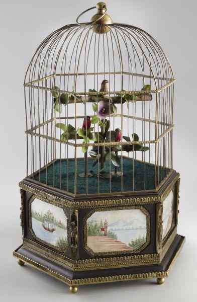 Appraisal: French gilt metal birdcage automaton the three red orange and