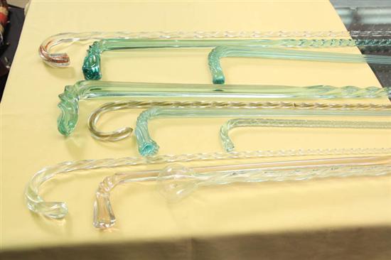 Appraisal: TEN GLASS CANES All clear glass some ribbed to l