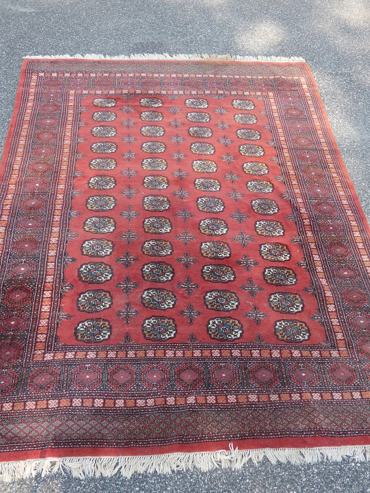 Appraisal: VINTAGE BOKHARA RUG Vintage Bokhara room size rug in a