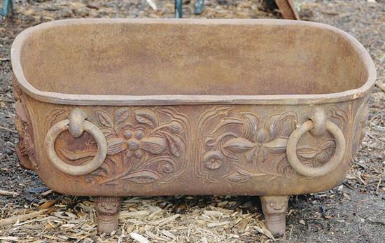 Appraisal: Cast-iron jardiniere tub form with raised floral decoration and ring