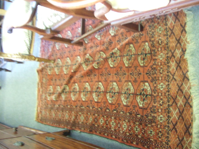 Appraisal: A Tekke Turkman rug the madder field with nine rows