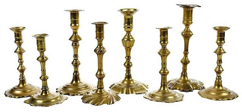 Appraisal: Eight Georgian Brass Candlesticks British th century various scalloped petal