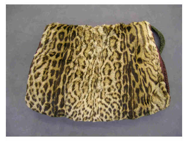 Appraisal: Leopard fur hand muff and clutch with back zipper closure