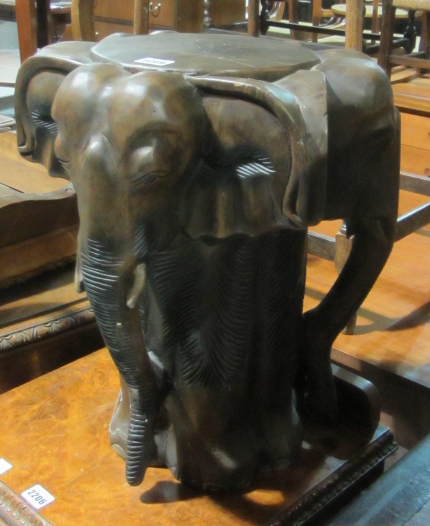 Appraisal: A th century hardwood carved elephant table