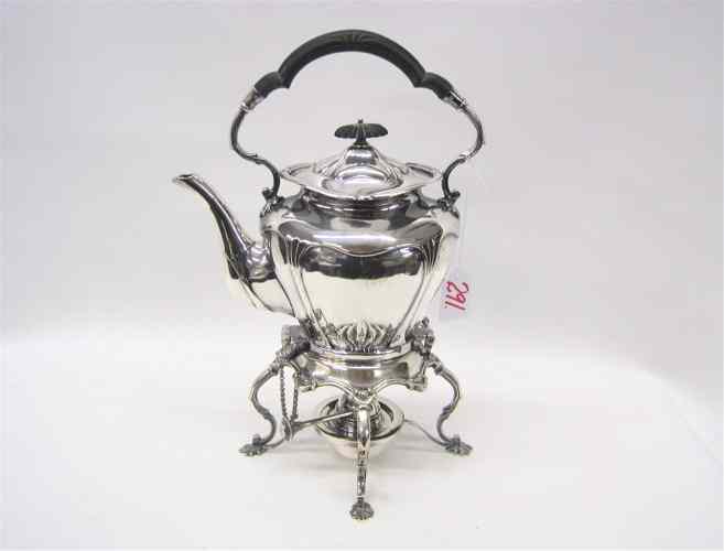 Appraisal: A VICTORIAN STYLE SILVER-PLATED TEA POT on attached tilt base