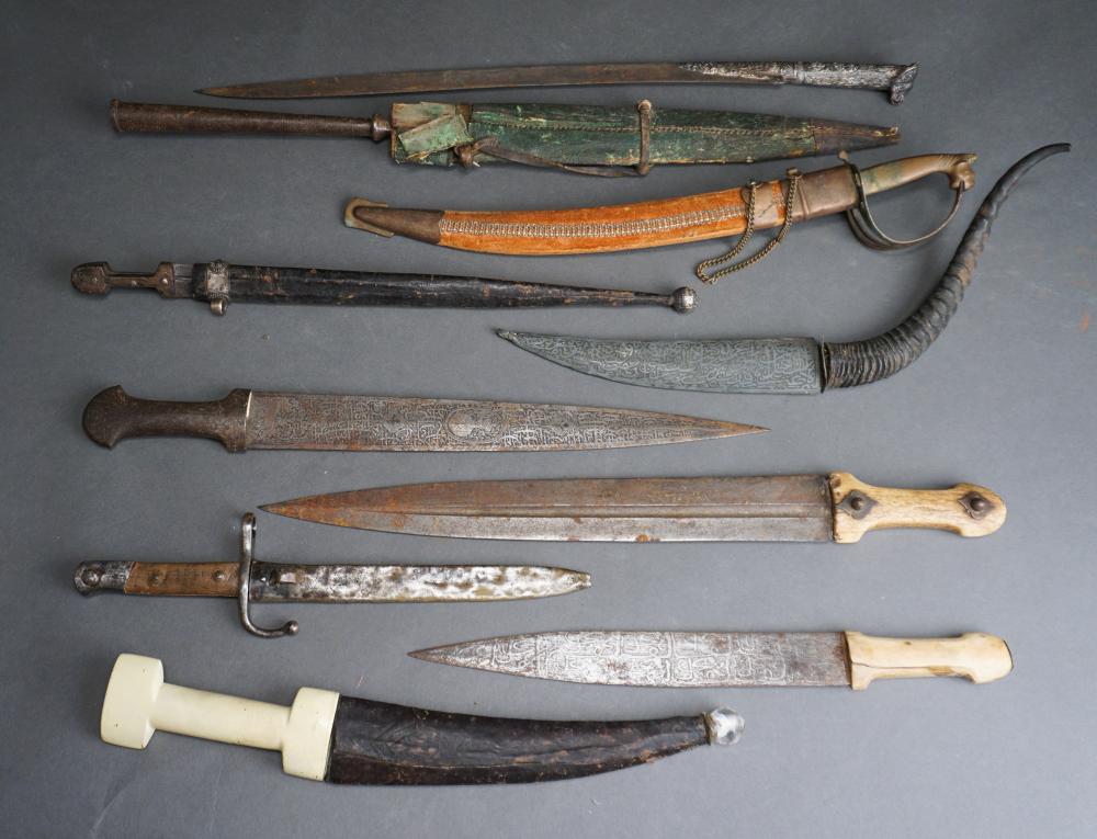 Appraisal: NINE MIDDLE-EASTERN AND NORTH-AFRICAN SHORT SWORDS PREDOMINANTLY QAMAS AND KINDJALS