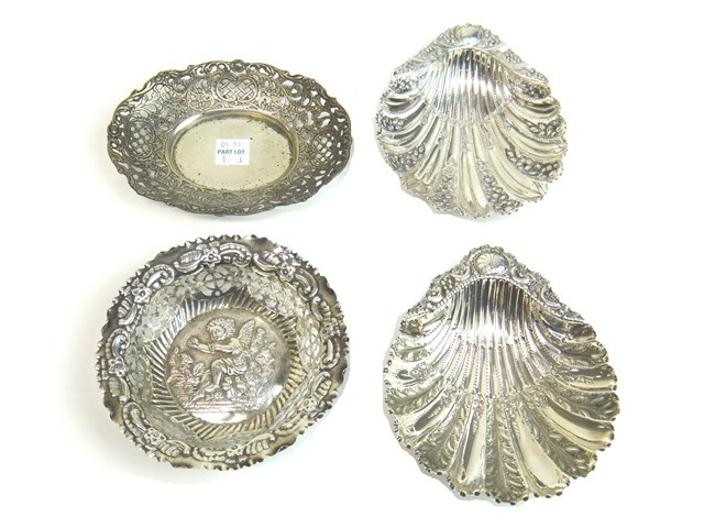 Appraisal: Silver comprising a shaped circular bonbon bowl the centre embossed