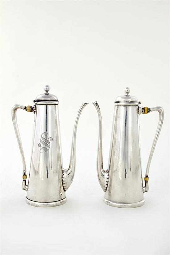 Appraisal: Pair Whiting sterling coffeepots New York dated elongated flaring body