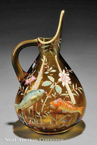 Appraisal: A Continental Sculpted and Enameled Amber Glass Ewer late th