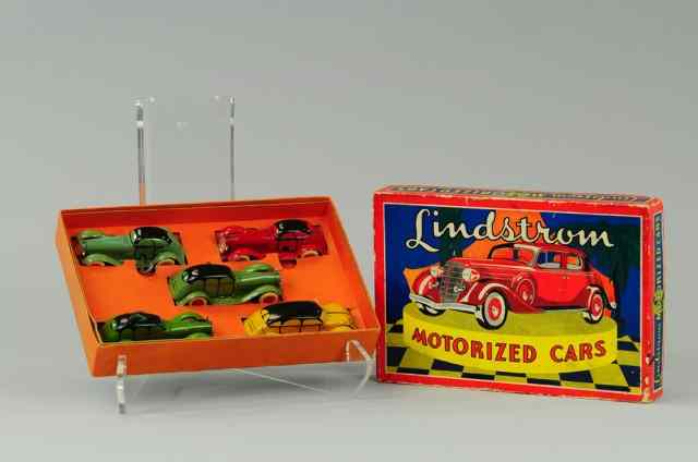 Appraisal: LINDSTROM MOTORIZED CAR SET Contains three wind-up autos and one