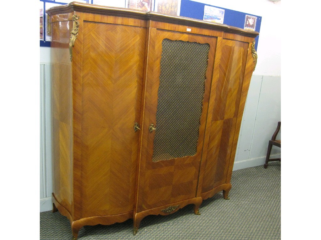 Appraisal: Continental walnut and ormolu mounted three section breakfront armoire the