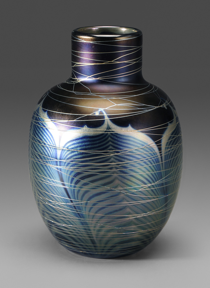 Appraisal: Art Glass Vase iridescent blue and gold bottle form pulled