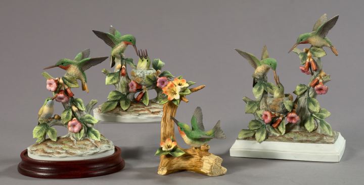 Appraisal: Group of Four Andrea by Sadek Hand-Painted Porcelain Figural Groups