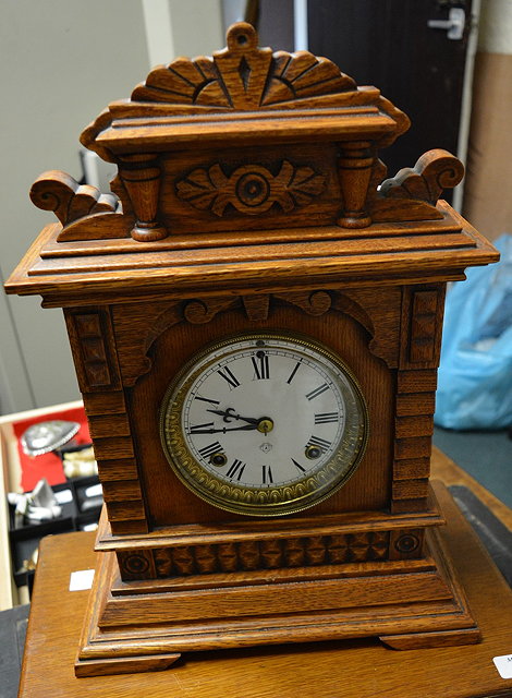 Appraisal: An American oak mantel clock by The Ansonia Clock Company