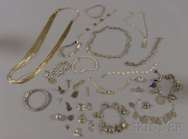 Appraisal: Group of Silver Jewelry including charm bracelets charms necklaces etc