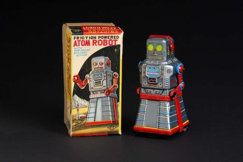 Appraisal: Tin Atom Robot Description Made in Japan by KO Crank-wind