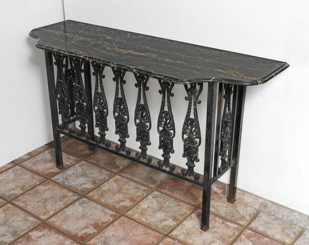 Appraisal: MARBLE TOP IRON TABLE Iron hall table having a surmounting