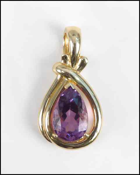 Appraisal: AMETHYST AND KARAT YELLOW GOLD PENDANT ENHANCER Pear shaped amethyst