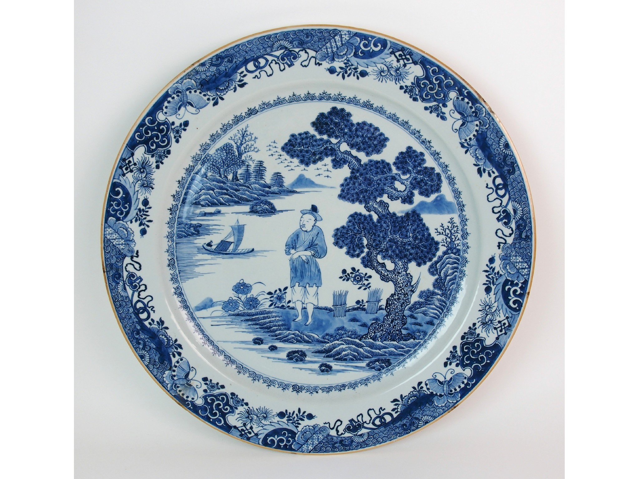 Appraisal: A Chinese blue and white chargerpainted with a man standing