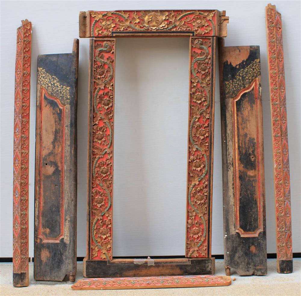 Appraisal: INDONESIAN CARVED AND PAINTED DOORWAY having a floral carved painted