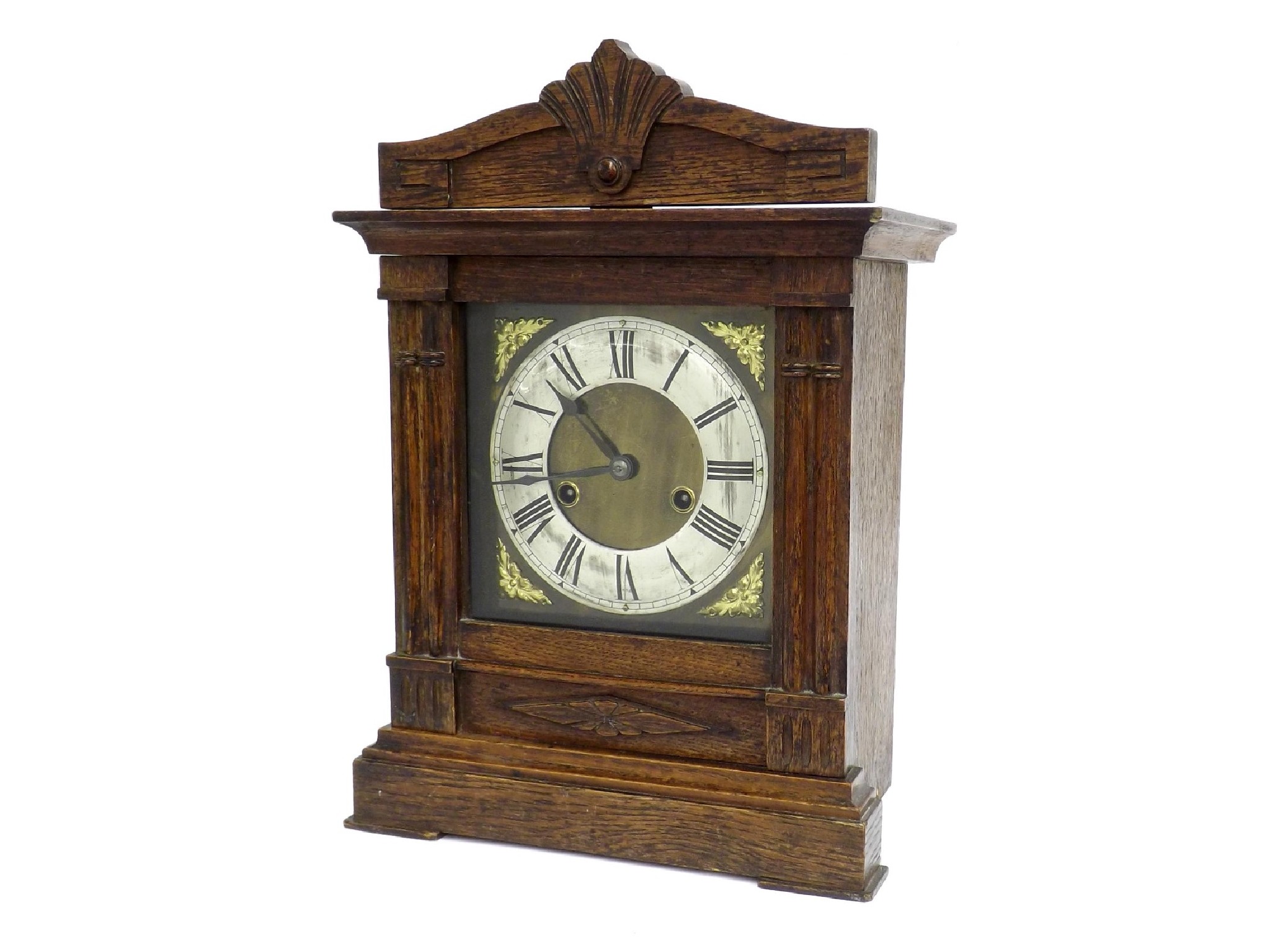 Appraisal: German oak two train mantel clock striking on a gong